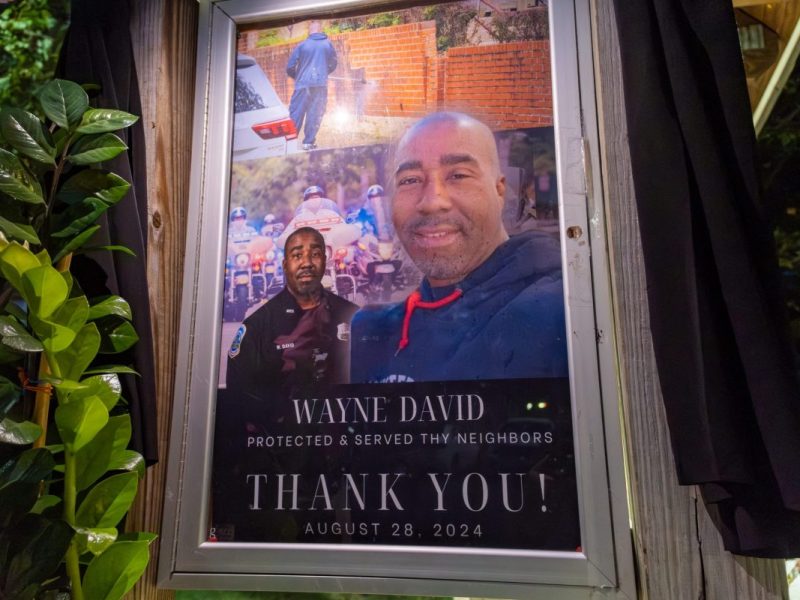 A vigil was held on the night of Sept. 12 in the Langdon neighborhood of Northeast D.C. to honor the life of fallen D.C. police investigator Wayne David, who died Wednesday after a gun he was trying to recover discharged. (Ja'Mon Jackson/The Washington Informer)