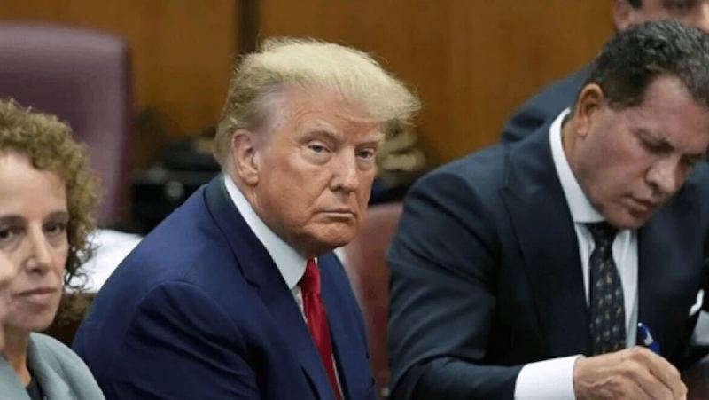 Former President Donald Trump appears in a New York City courtroom on April 4 for his arraignment on 34 felony counts related to payoffs for an alleged tryst with a porn star. (Courtesy photo)