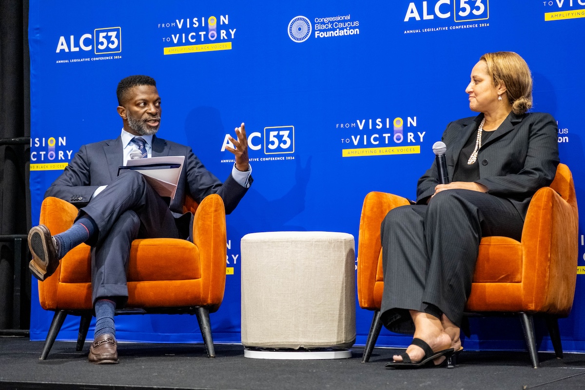 Moderator Anthony Coley dives into the importance of diverse representation in clinical trials with panelist Teshia Harris. (Ja'Mon Jackson/The Washington Informer)