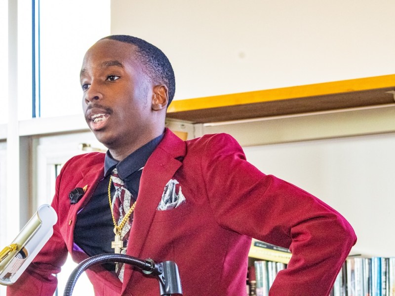 On Aug. 29, Calique Barnes, dressed to the nines in a fitted burgundy suit, took the podium and reflected on how his community prepared him for the next level of student leadership. (Cleveland Nelson/The Washington Informer)