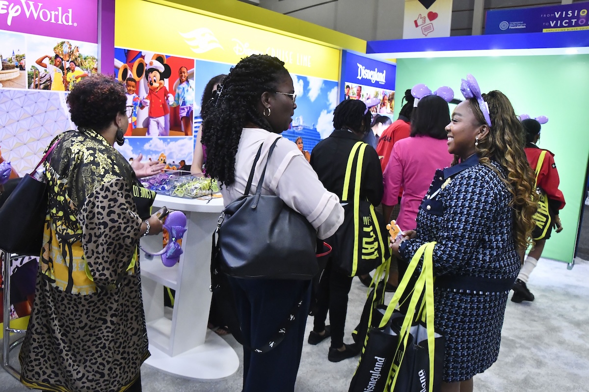 People gather at the Disney booth in the exhibit hall during the Congressional Black Caucus Foundation's Annual Legislative Conference. (Robert R. Roberts/The Washington Informer)