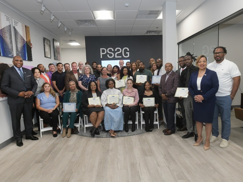 Public Sector Solutions Group (PS2G), along with leaders from Pepco and Exelon, celebrate with graduates from their Cybersecurity Training Program in June. (Courtesy photo)