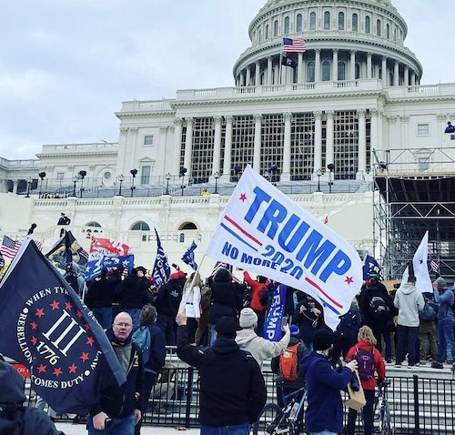 Trump supporters gather outside the Capitol on Jan. 6 as Congress prepares to affirm President-elect Joe Biden's victory. (Anthony Tilghman/The Washington Informer)