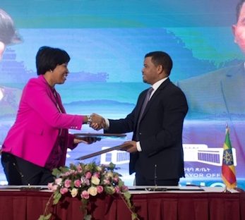 Mayors Bowser and Benti exchange the renewed Sister City Agreements that they signed at the Addis Ababa Municipality Building on November 11 and witnessed by over 100 officials including U.S. Ambassador Michael Raynor and Ethiopian Ambassador Fitsum Arega.