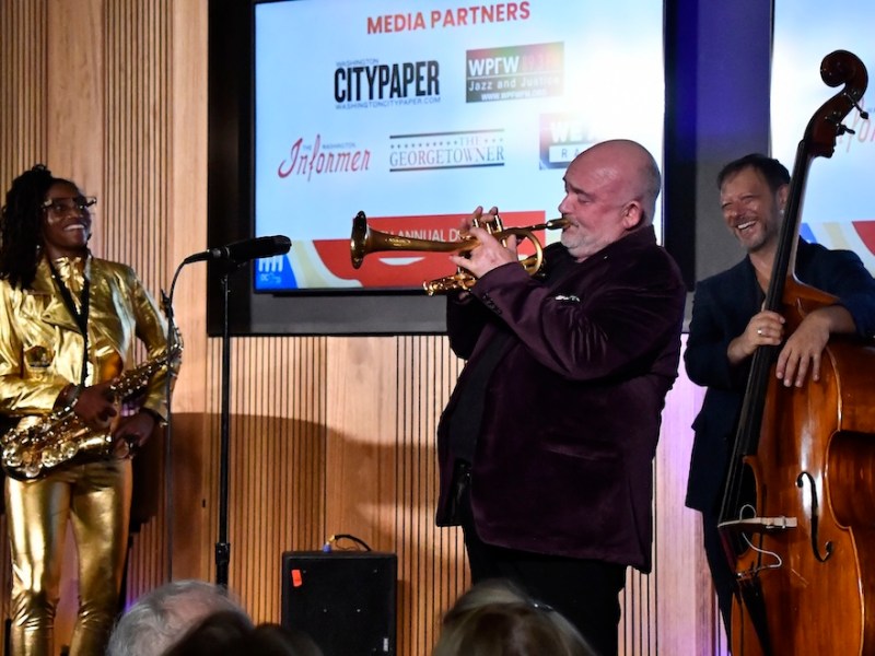 The 20th Anniversary DC JazzFest opens with a performance at the Embassy of Australia with Lakecia Benjamin, Phoenix, and James Morrison. (L-R) Benjamin is on alto saxophone, James Morrison is on fluegelhorn, and Elias Bailey is on bass. (Robert R. Roberts/The Washington Informer)