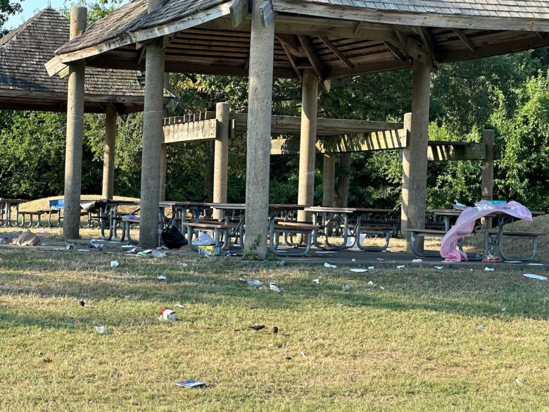 A park shelter is left littered with trash. (D.R. Barnes/The Washington Informer)