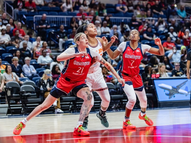 **FILE** Washington Mystics Emily Engster and Ariel Atkins in a game against the Connecticut Sun. Since the close of the 2024 Summer Olympics, the Washington Mystics are continuing the last half of their season with hopes to improve their record with the return of key players. (Jonae Guest/The Washington Informer)