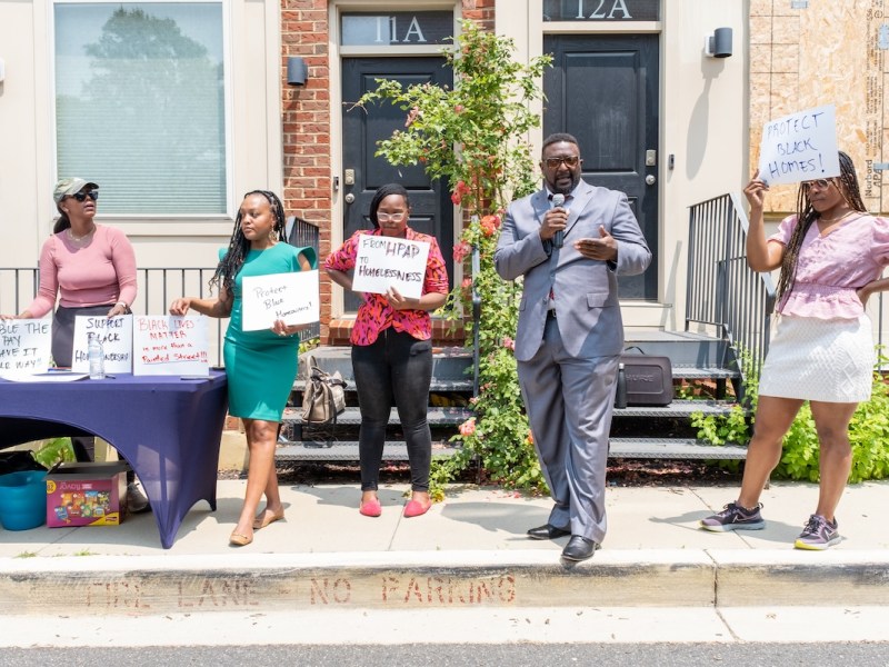 After nearly four years of fighting for recompense, rallying (as pictured here in May 2023) and contentious mortgage relief negotiations, most, if not all, of the owners of condemned condominiums on Talbert Street in Southeast have received mortgage relief. However, there is still work to be done to ensure beleaguered homeowners can afford to settle elsewhere in the District. (WI File Photo)